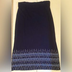 Maxi Navy Blue skirt with intricate design on the bottom.